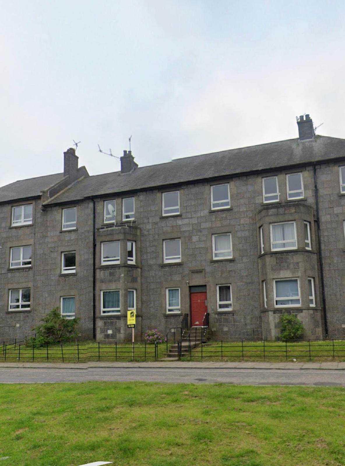 Tenement exterior before refurbishment