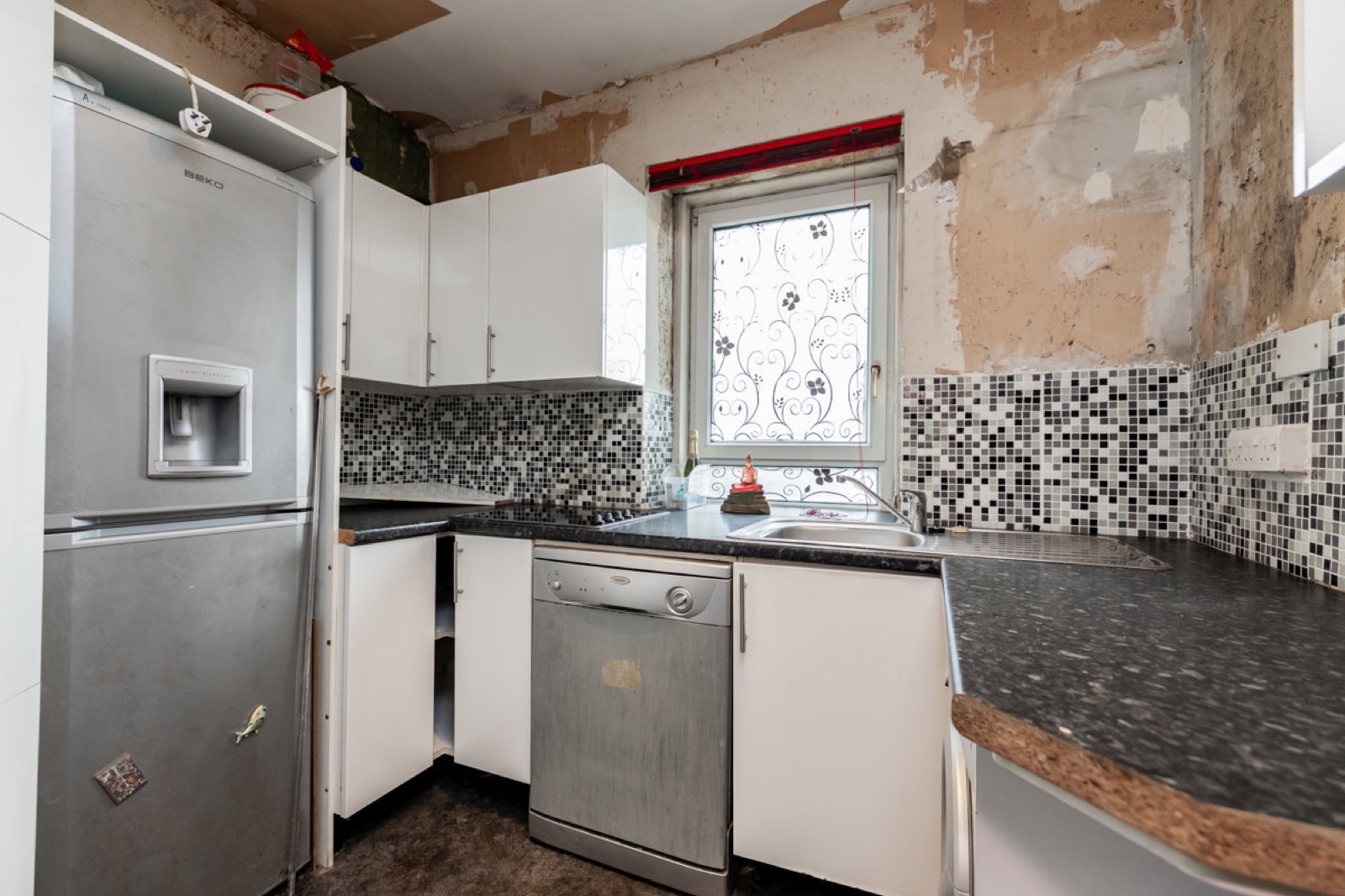 Dated kitchen before refurbishment