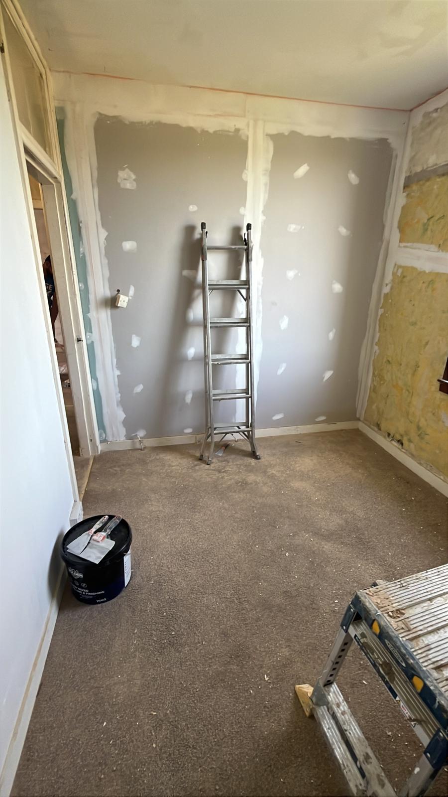 Re-plastering walls during refurbishment
